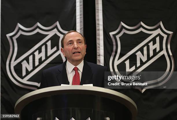 National Hockey League Commissioner Gary Bettman speaks with the media at a press conference announcing the start of the NHL season at the Westin...