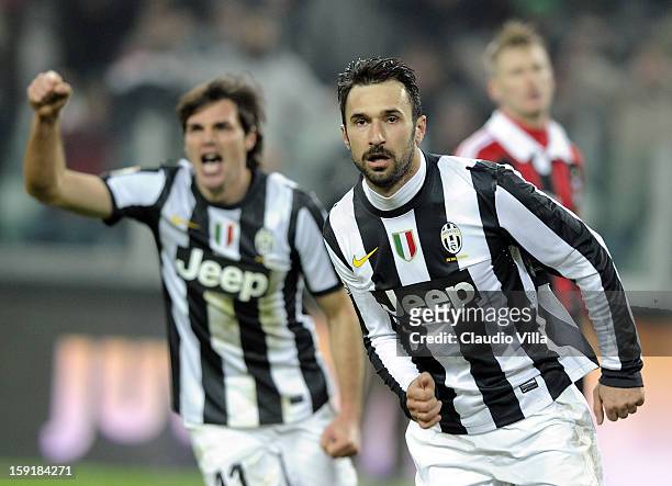 Mirko Vucinic of Juventus FC celebrates scoring the second goal during the TIM cup match between Juventus FC and AC Milan at Juventus Arena on...