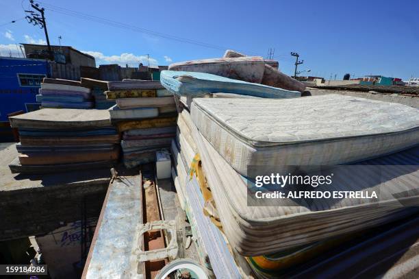 View of used mattresses at the Recycling Center at Nezahualcoyotl, State of Mexico, on January 2013. AFP PHOTO/Alfredo Estrella