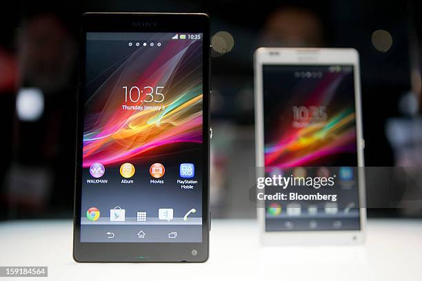 Sony Corp. Xperia ZL smartphones sit on display during the 2013 Consumer Electronics Show in Las Vegas, Nevada, U.S., on Wednesday, Jan. 9, 2013....