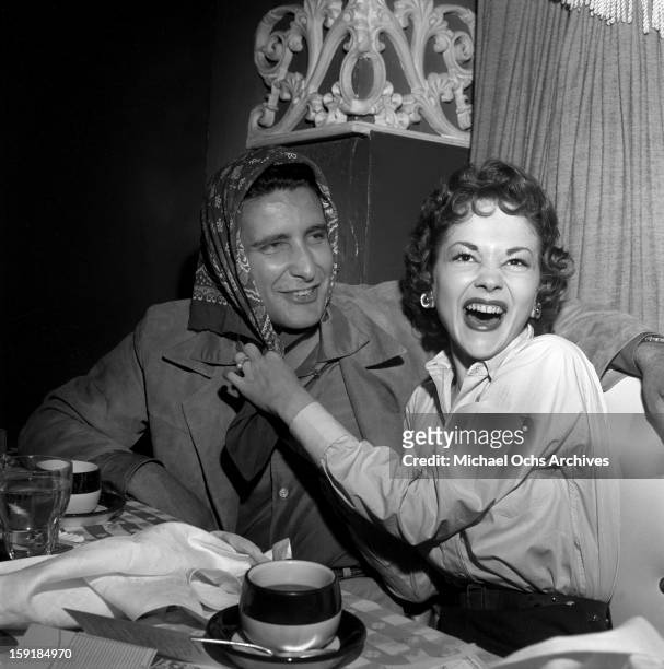 Actress Helene Stanley hams it up with LA gangster Johnny Stompanato at Ciro's nightclub on May 24 1954 in Los Angeles, California.