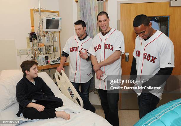 Boston Red Sox rookies Bryce Brentz, Alex Hassan, and Xander Bogaerts spread cheer to Tyler at Boston Children's Hospital on January 9, 2013 in...