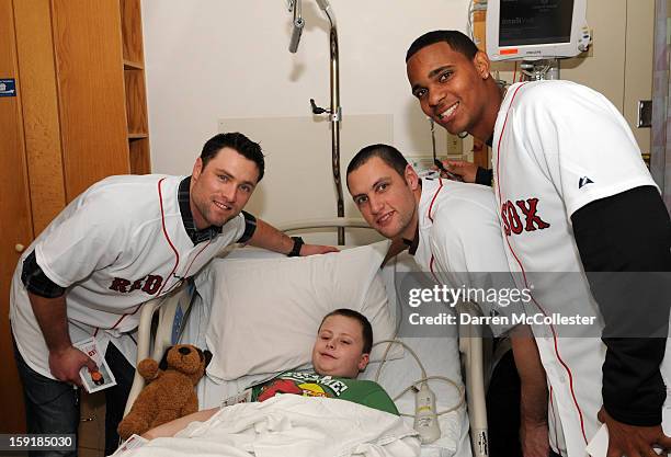 Boston Red Sox rookies Bryce Brentz, Alex Hassan, and Xander Bogaerts spread cheer to Aidan at Boston Children's Hospital on January 9, 2013 in...