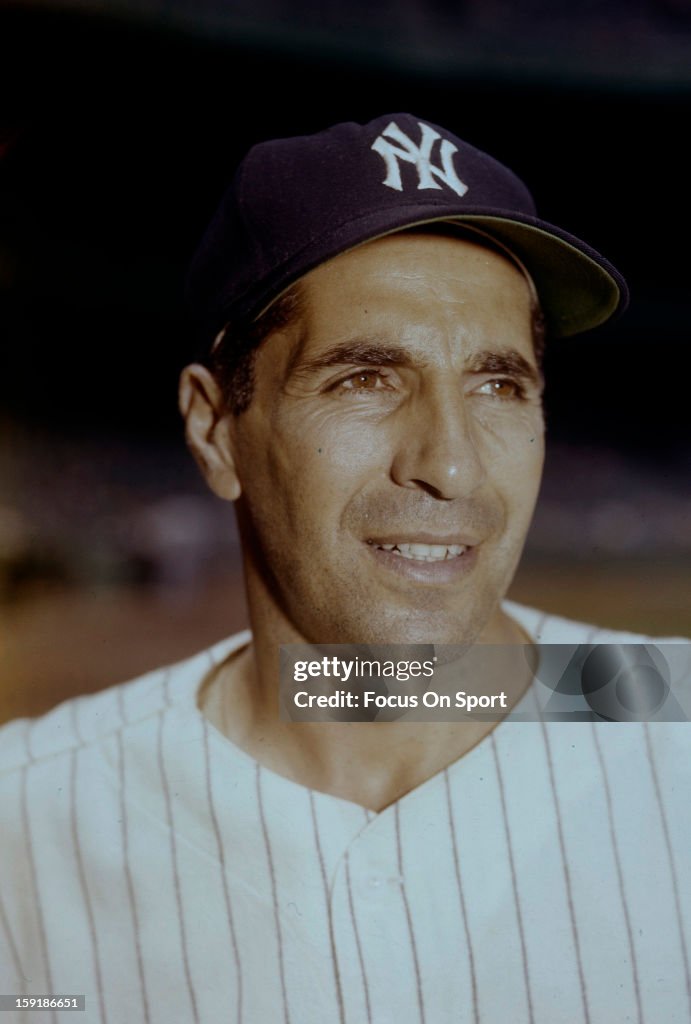 Phil Rizzuto Cora Rizzuto Phil Rizzuto of the New York Yankees poses for this photo before a ...