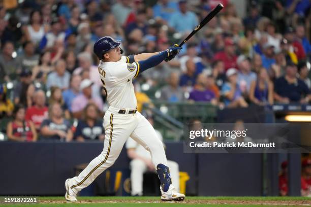 Tyrone Taylor of the Milwaukee Brewers hits a two-run home run in the seventh inning against the Cincinnati Reds at American Family Field on July 26,...