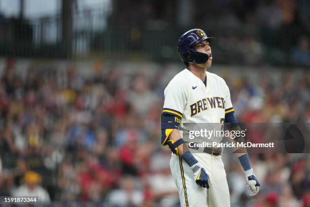 Christian Yelich of the Milwaukee Brewers reacts in the fifth inning against the Cincinnati Reds at American Family Field on July 26, 2023 in...