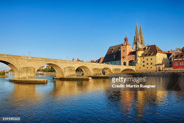 historic regensburg with danube river. - danube river fotografías e imágenes de stock