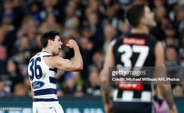 Oliver Henry of the Cats celebrates a goal during the 2023 AFL Round 22 match between the Collingwood Magpies and the Geelong Cats at Melbourne...