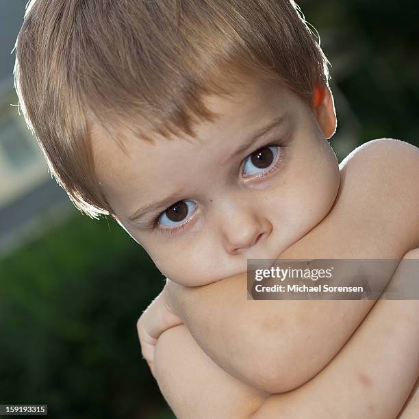 crossed arms boy - michael virtue stock pictures, royalty-free photos & images