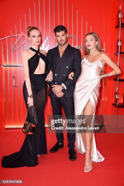 Xenia Tchoumi, Kevin Lütolf and Zoe Holthuizen attend the Davide Campari Lounge during Locarno Film Festival 2023 on August 03, 2023 in Locarno,...
