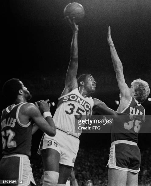 American basketball player Jamaal Wilkes, Lakers small forward, American basketball player Paul Silas, SuperSonics power forward, and American...