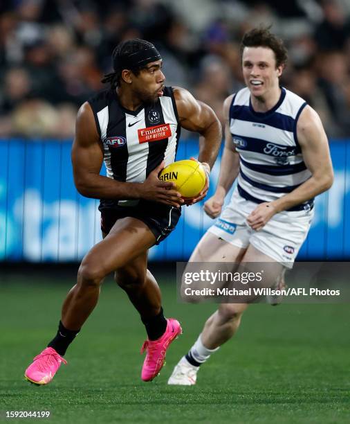 Isaac Quaynor of the Magpies in action during the 2023 AFL Round 22 match between the Collingwood Magpies and the Geelong Cats at Melbourne Cricket...