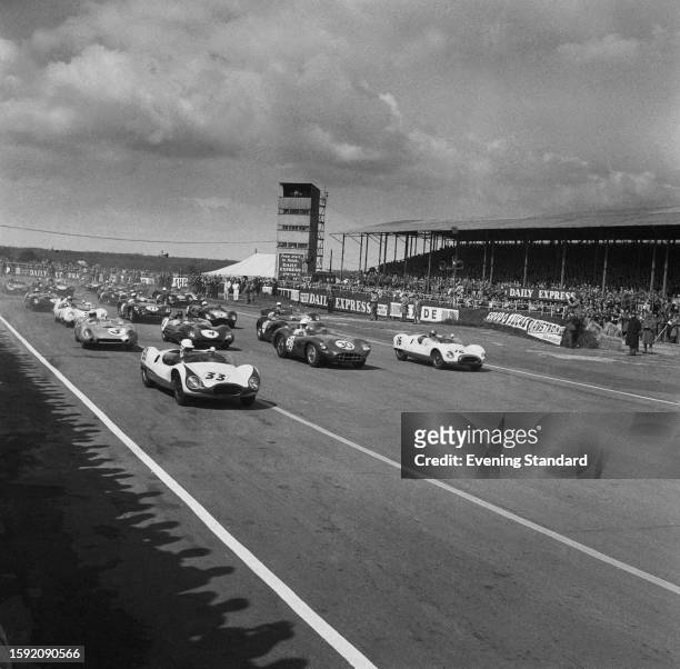 Racing cars on the track at Silverstone circuit in Northamptonshire for the BRDC International Trophy race meeting, May 2nd 1959.