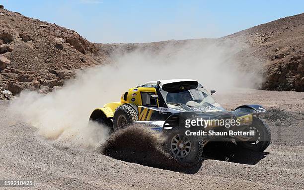 Pascal Thomasse and co-pilot Pascal Larroque of team Buggy MD Rallye compete in stage 5 from Arequipa to Arica during the 2013 Dakar Rally on January...