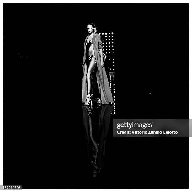 Model walks the runway during the Ermanno Scervino fashion show as part of Pitti Immagine Uomo 83 at Palazzo Vecchio on January 9, 2013 in Florence,...