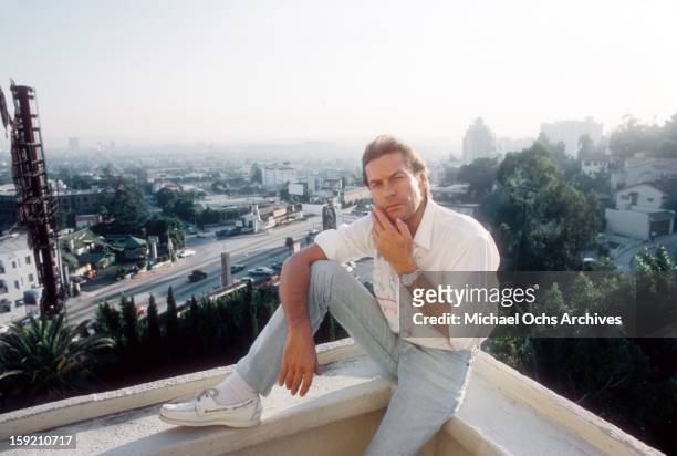 Austrian actor Helmut Berger poses for a portrait at The Chateau Marmont Hotel in October, 1983 in Los Angeles, California.