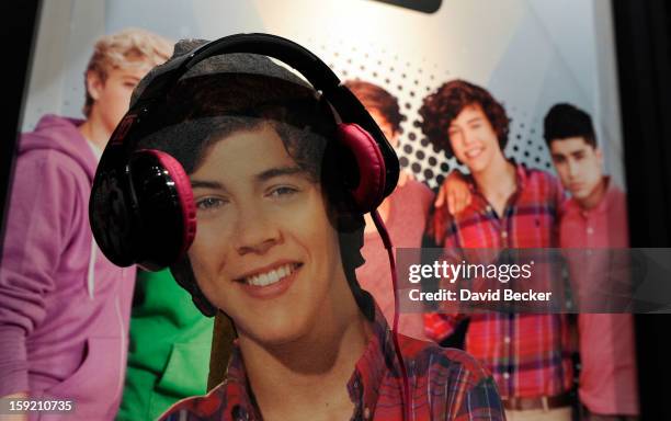 Cut outs of the band One Direction are used to promote headphones at the Jazwares booth at the 2013 International CES at the Las Vegas Convention...