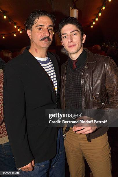 Actor Simon Abkarian and his son Djivan Abkarian pose after Simon Abkarian performed on stage during the premiere of 'Menelas rebetiko rapsodie', he...