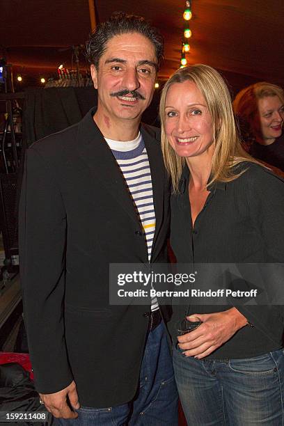 Actor Simon Abkarian and actress Catherine Marchal pose after Abkarian performed on stage during the premiere of 'Menelas rebetiko rapsodie' he wrote...