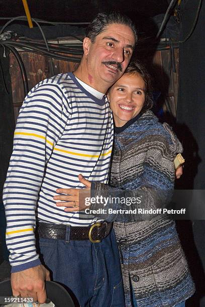 Actor Simon Abkarian and actress Virginie Ledoyen pose after Abkarian performed on stage during the premiere of 'Menelas rebetiko rapsodie' he wrote...