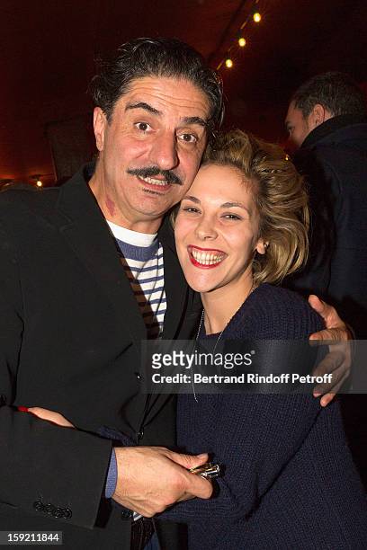Actor Simon Abkarian and actress Alysson Paradis pose after Abkarian performed on stage during the premiere of 'Menelas rebetiko rapsodie' he wrote...