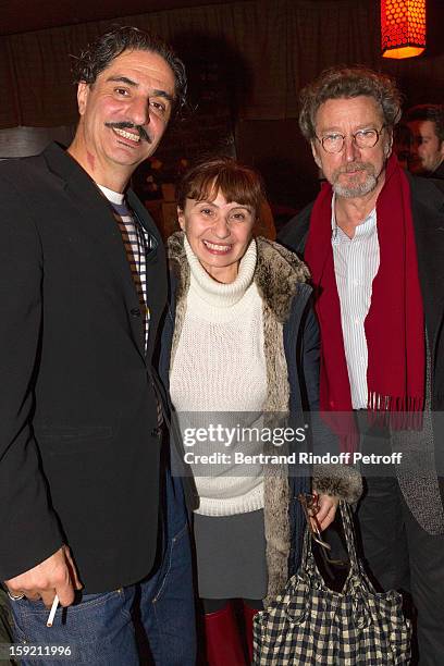 Actor Simon Abkarian, actress Ariane Ascaride and her husband, director Robert Guediguian, pose after Abkarian performed on stage during the premiere...