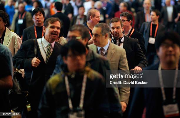 Attendees file out of the convention hall at the 2013 International CES at the Las Vegas Convention Center on January 9, 2013 in Las Vegas, Nevada....