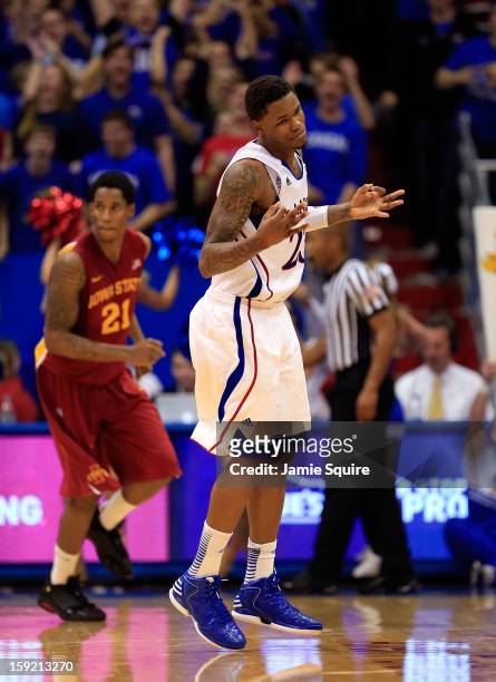 Ben McLemore of the Kansas Jayhawks reacts after sinking a three-pointer during the game against the Iowa State Cyclones at Allen Fieldhouse on...