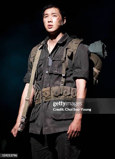 Ji Hyun-Woo performs during the musical 'The Promise' press call at the National Theater of Korea Main Hall 'Hae' on January 8, 2013 in Seoul, South...