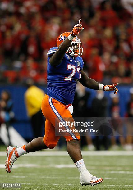 Sharrif Floyd of the Florida Gators reacts after a teammate blocked a field goal against the Louisville Cardinals during the Allstate Sugar Bowl at...