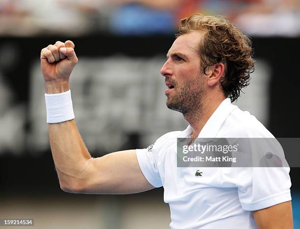 Julien Benneteau of France celebrates winning match point in his quarter final match against Ryan Harrison of USA during day five of the Sydney...