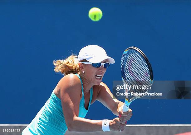 Anastasia Rodionova of Australia plays a backhand during her matach against Nastassja Burnett of Italy during Australian Open qualifying at Melbourne...