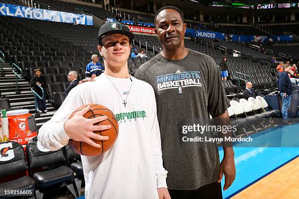Dunn, assistant coach for the Minnesota Timberwolves, right, poses with Cody Metz, in attendance through the Make-A-Wish Foundation, before a game...
