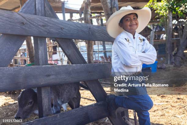 Boys On Ranches 215 Kids With Calf On Ranch Stock Photos, High-Res Pictures, and Images ...