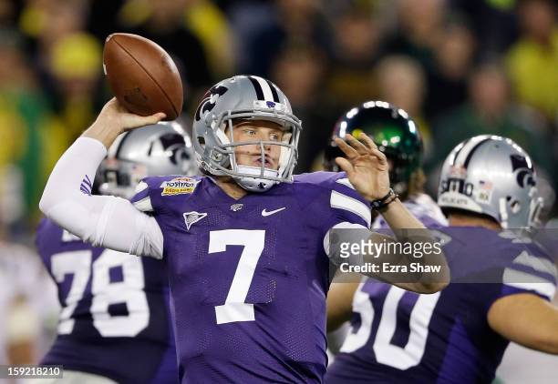 Collin Klein of the Kansas State Wildcats drops back to pass against the Oregon Ducks during the Tostitos Fiesta Bowl at University of Phoenix...