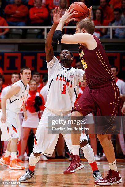 Richardson of the Illinois Fighting Illini defends against Elliott Eliason of the Minnesota Golden Gophers during the game at Assembly Hall on...