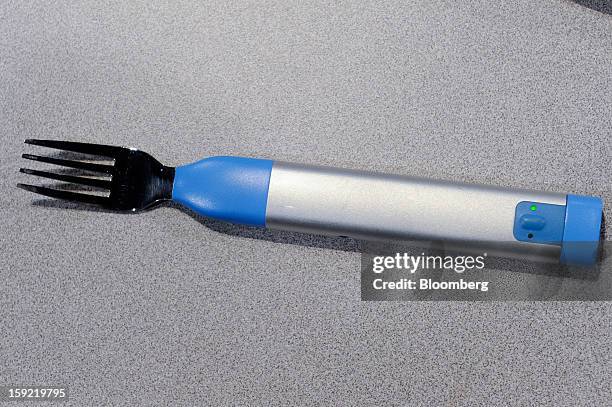 The Hapifork, manufactured by Hapilabs Inc., is arranged for a photograph during the 2013 Consumer Electronics Show in Las Vegas, Nevada, U.S., on...