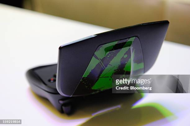 The Nvidia Corp. Shield gaming device is arranged for a photograph at the 2013 Consumer Electronics Show in Las Vegas, Nevada, U.S., on Wednesday,...