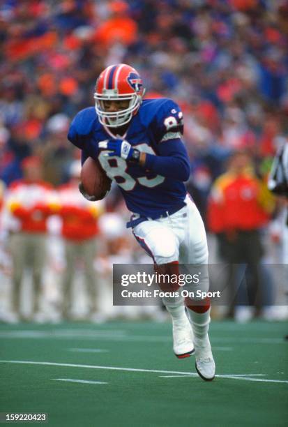 Wide Receiver Andre Reed of the Buffalo Bills carries the ball against the Kansas City Chiefs during the AFC/NFL Conference Championship Playoff...