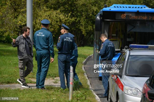 Security officers are seen working at the area where a Ukrainian drone attempted to attack in Moscow, Russia on August 11, 2023. Russian Defence...