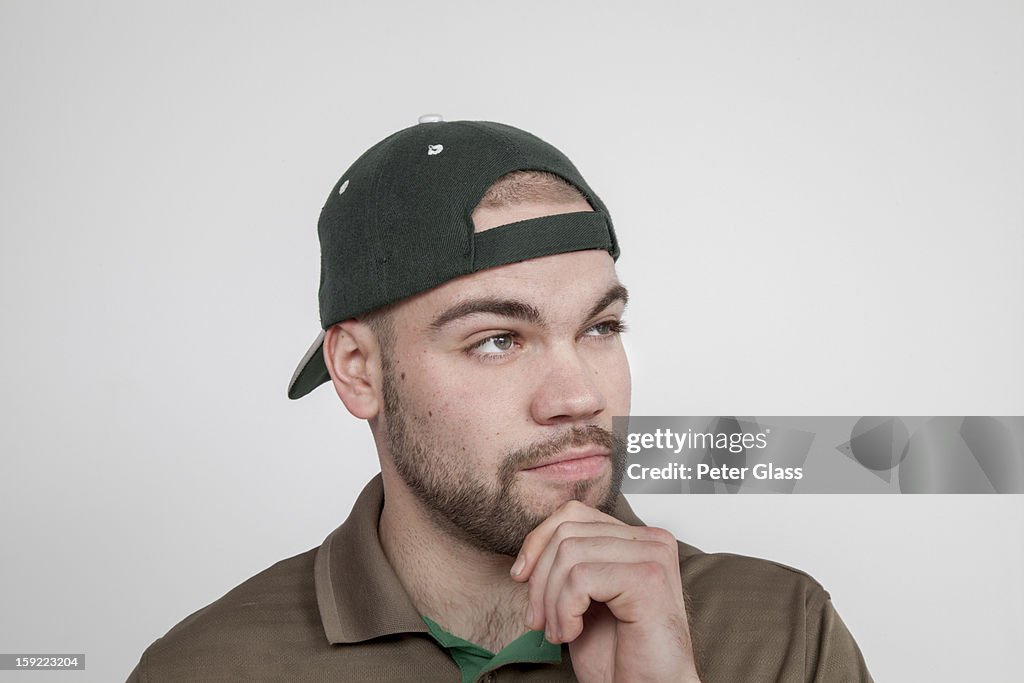 Young man wearing a baseball cap