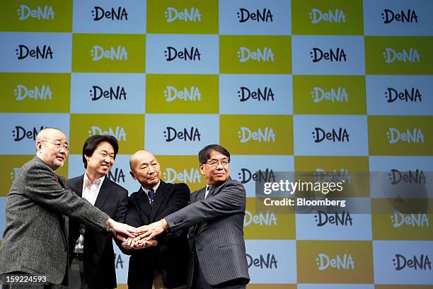 Naoki Kitagawa, chief executive officer of Sony Music Entertainment Japan Inc., from left, Isao Moriyasu, president of DeNA Co., Kazuhiko Koike,...