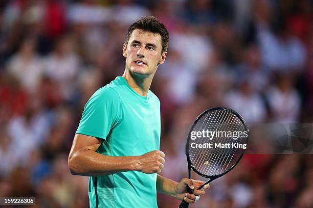 Bernard Tomic of Australia celebrates breaking serve in his quarter final match against Jarkko Nieminen of Finlan during day five of the Sydney...