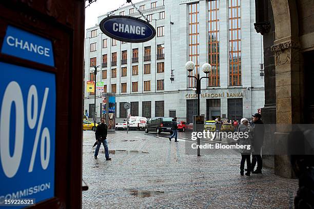 Currency exchange stands opposite the Czech central bank, center, in Prague, Czech Republic, on Tuesday, Jan. 8, 2013. The Czech economy is showing...