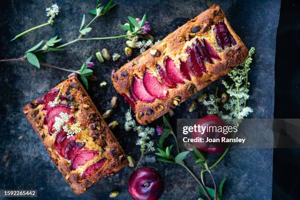 plum and almond cake - tea set stock pictures, royalty-free photos & images