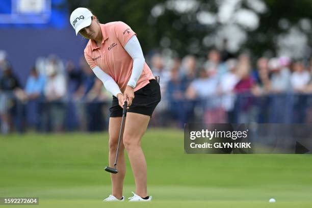 Golfer Ally Ewing putts on the 18th green on day 2 of the 2023 Women's British Open Golf Championship at Walton Heath Golf Club in...