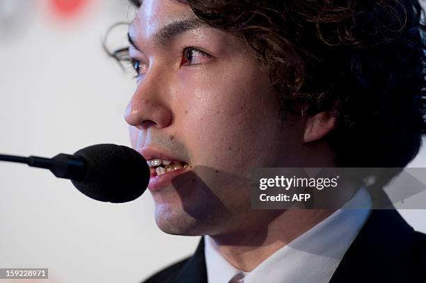 Tokyo 2020 bid ambassador and three-time swimming Paralympian and London 2012 Games bronze medalist, Takayuki Suzuki, speaks during a press...