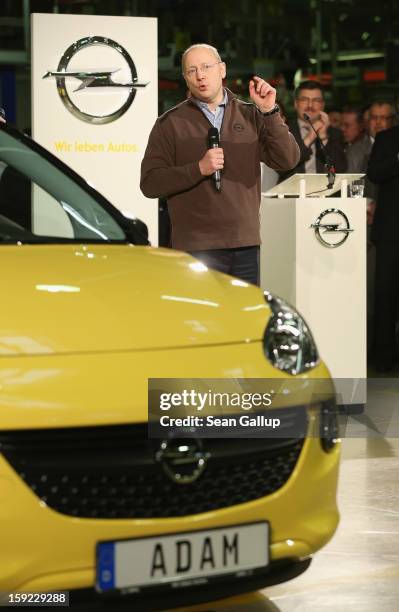 Steve Girsky, General Motors Vice Chairman and head of GM Europe, speaks next to an Opel Adam car fresh from the assembly line during a celebration...