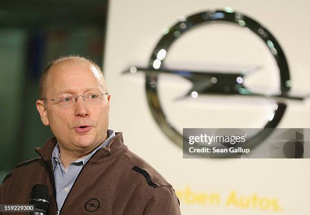 Steve Girsky, General Motors Vice Chairman and head of GM Europe, speaks Opel logo during a celebration to mark the launch of the new Opel Adam...