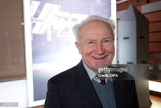 German cosmonaut Sigmund Jaehn poses on January 10, 2013 at the orbitall space center of the FEZ youth education and leisure park in Berlin on the...